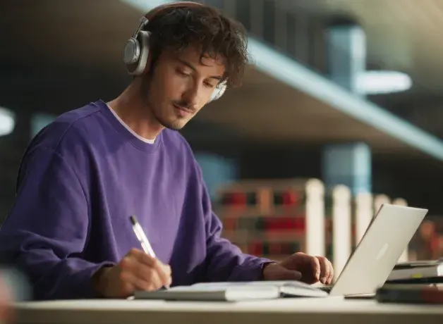 Man studying with headphones